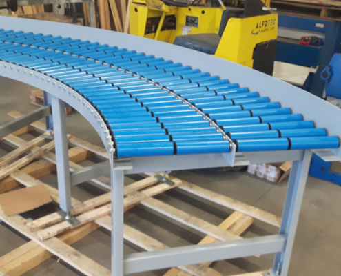 idlers on conveyor system blue