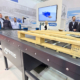 Palettenförderung auf einem Rollenförderer mit Hubtisch – Exponat der LogiMAT 2025